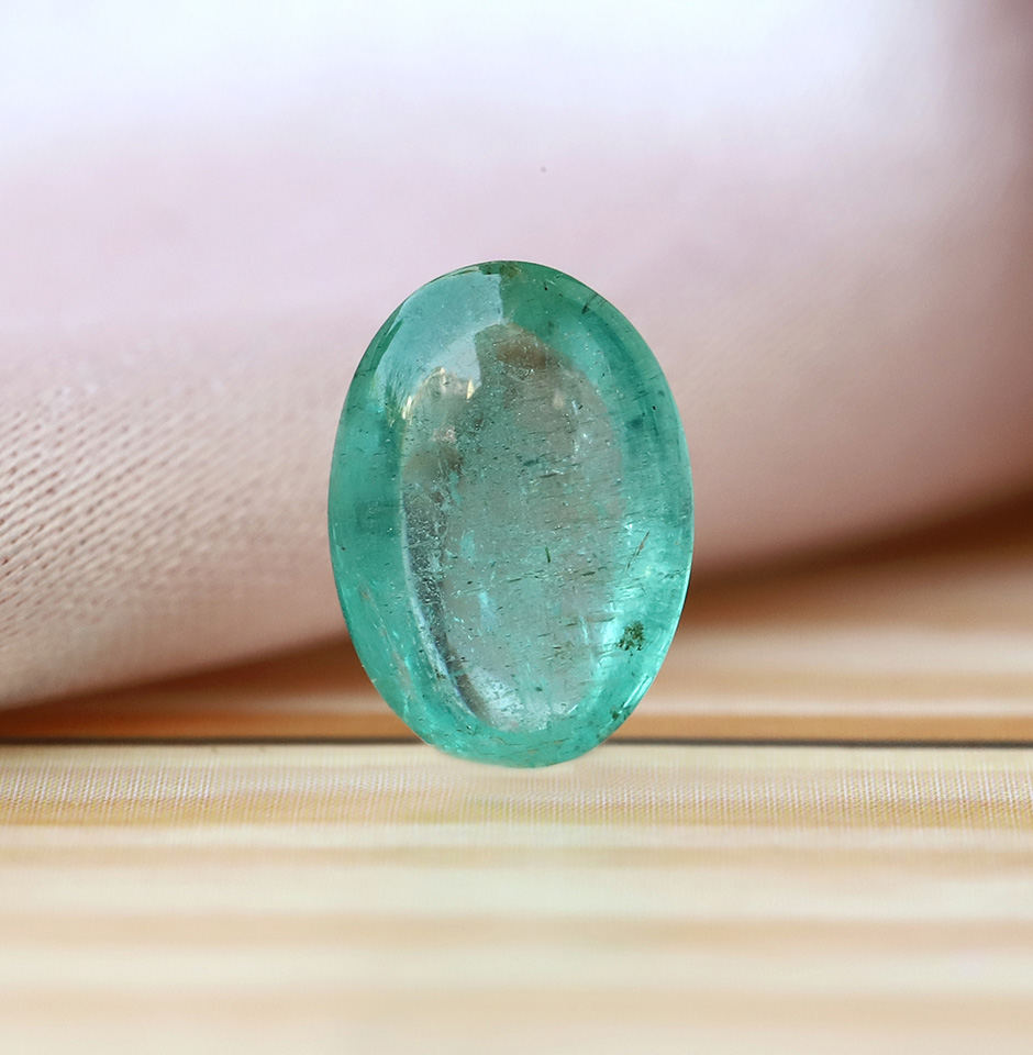1.5 Cts. Clean Emerald Cabochon Oval Shape